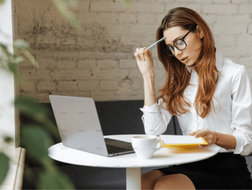 demo-attachment-2051-thoughtful-business-woman-indoors-using-laptop-P5HYUQX@2x-1-min-238